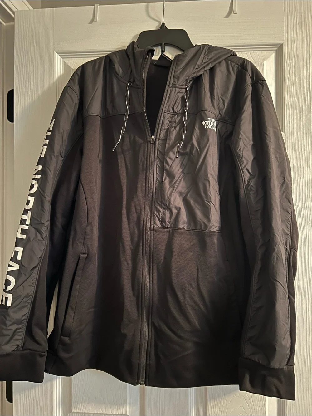 The North Face Men's Black Hooded Lightweight Jacket with Sleeve Logo